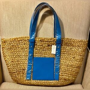 Handmade summer woven bag with blue leather handle and pocket in front